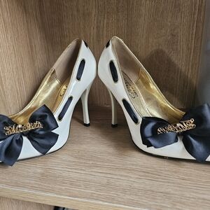 Elegant Black and White Heels with Bow